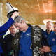US astronaut Mark Vande Hei (C) of NASA receives a traditional Kazakh hat after a press conference in Dzhezkazgan on February 28, 2018. / AFP PHOTO / POOL / Alexander NEMENOV